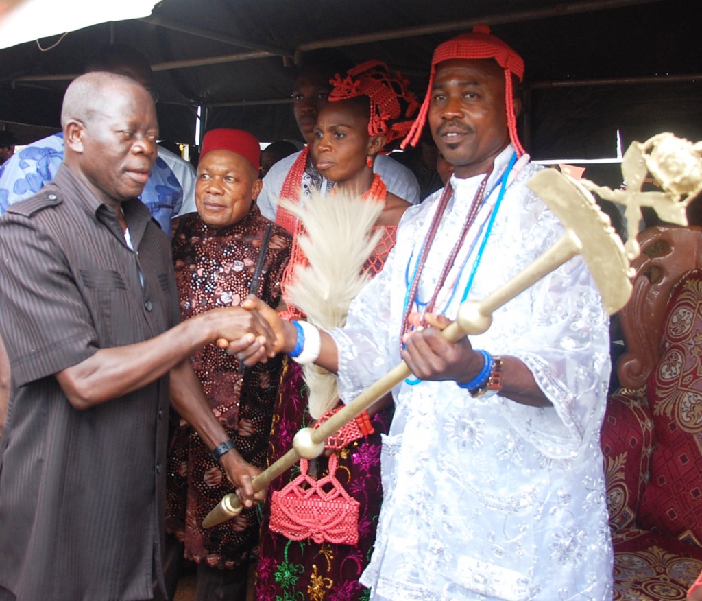 Governor Adams Oshiomhole of Edo State presents the Staff of Office to Alhaji Jackson Etokhana, the Oghieavhianwu of Avhianwu, at his installation ceremony, Saturday.