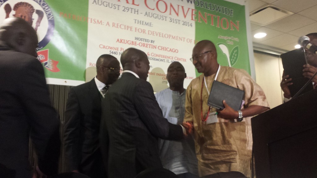 Edo State Governor, Comrade Adams Oshiomhole (third from left) being welcomed into the convention by his Chief of Staff Barr. Patrick Obahiagbon (first from right), the Chairman, Council of Presidents, Edo National Association Worldwide, Barr. Dickson Iyawe and the National President of the organization, Mr. Franklin Omoruna (first and second from left)