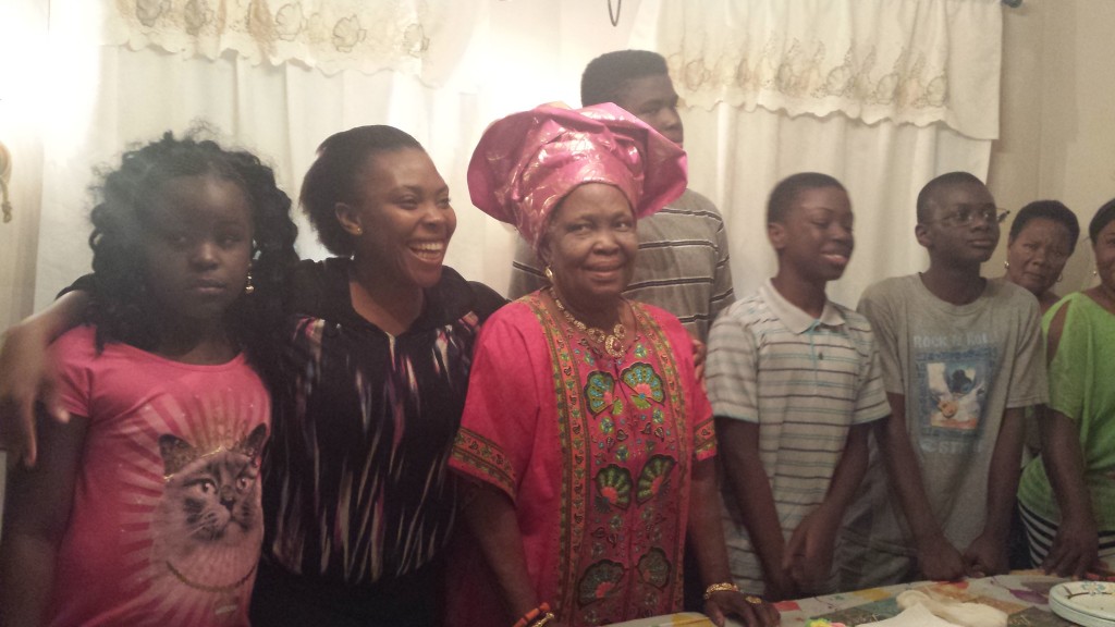 Madam Omorotionmwan with grandchildren and some family friends.