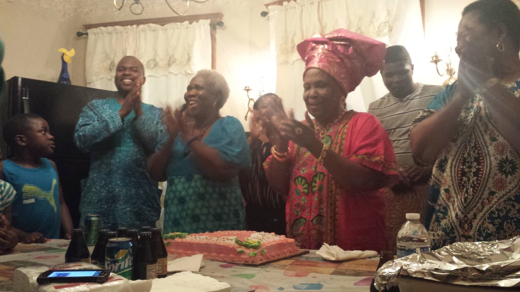 Madam Omorotionmwan with members of her family and friends singing praises to God.