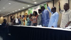 Photo, By Alltimepost.com shows members of the Executive and Board of Advisors, Edo National Association Worldwide being sworn in
