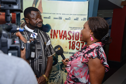 Producer-director Lancelot Oduwa Imasuen speaks to a journalist at the media unveiling of 'INVASION 1897' in Lagos, Nigeria.