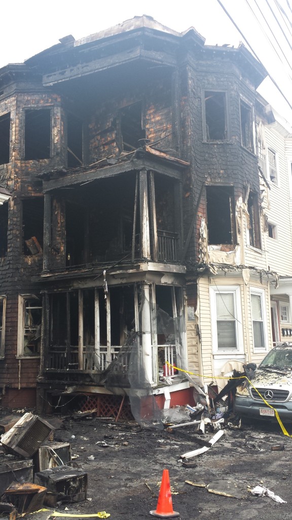 The remains of 12 Bennett Circle in Lynn following the devastating fire incident.