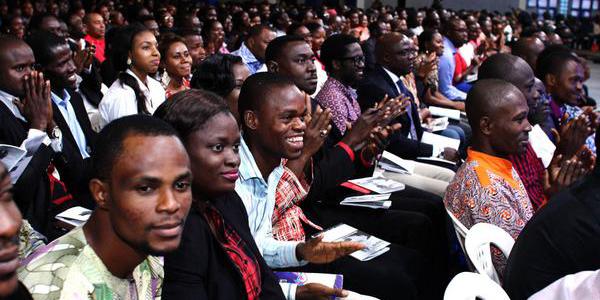 Auditorium filled with motivated and inspired participants