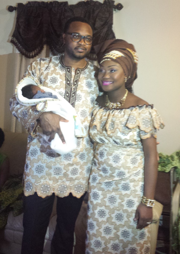 Mr.  Alfred and Mrs. Ebegue Ativie, with their new-born baby during the naming ceremony.