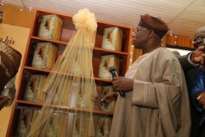 Former Nigeria President, Chief Olusegun Obasanjo cutting the tape at the presentation of ‘My Watch’- A Memoir by Olusegun Obasanjo