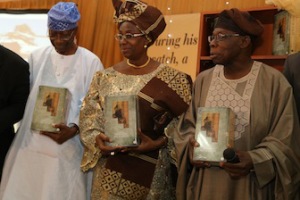 from right, former President/Author, Olsegun Obasanjo and his wife Bola with Prof. Olu Akinkugbe, presenting the book Tittle My Watch- A Memoir by Olusegun Obasanjo