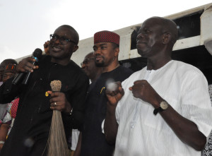 From left: Maj-Gen Charles Arhiavbere (rtd), Hon Richard Lamai and Governor Adams Oshiomhole (right) during the decamping of General Arhiavbere, the governorship candidate of the PDP in the 2012 election in Edo State, and Hon Lamai to the APC on Sunday.