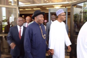 President Goodluck Jonathan shows President-elect, Muhammadu Buhari round the Presidential chambers after hand-over note presentation