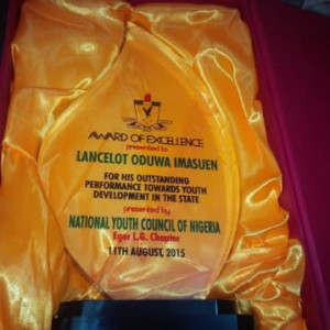 Lancelot Oduwa Imasue's Award of excellence for his  contributions to youth development presented by the National Youth Council  of Nigeria.