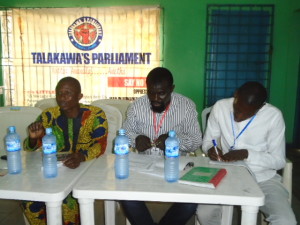 Leader of the Talakawas Parliament,Marxist Kola Edokpayi flanked by two executives of the Human Rights group at their Secretariat in Benin City.
