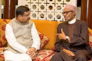 President-Muhammadu-Buhari-with-India’s-Minister-of-Petroleum-Mr-Dharmendra-Pradhan-as-he-arrives-Indirha-Ghandi-International-Airport-ahead-of-his-4-day-official-visit-to-New-Delhi-India1