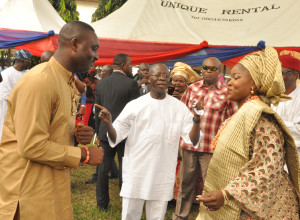 Governor Adams Oshiomhole dances with Flying Officer Umaso Eketu and Eniye Oyegun, daughter of the APC National Chairman, Chief John Odigie-Oyegun at their traditional wedding in Benin City, on Saturday.