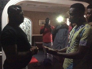 Mr. Lancelot Imasuen, left  while being presented with the  award by the Presidenat of the National Union of Benin Students, Mr. Osazee  Igiogbe (right).