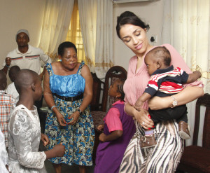 MILK OF KINDNESS: Mrs Iara Oshiomhole with orphans at Cornestone of Hope Orphanage during her continuous visit to orphanages in Edo State to present relief items to children in the homes.