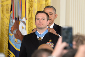 President Barack Obama presents the Medal of Honor to Navy Senior Chief Petty Officer Edward C. Byers Jr. during a White House ceremony, Feb. 29, 2016. Byers received the medal for actions while serving as part of a team that rescued an American civilian held hostage in Afghanistan in 2012. DoD photo by EJ Hersom.