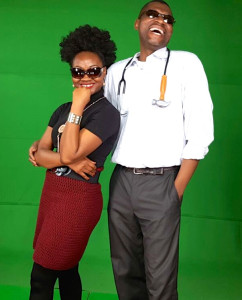 Adeola and Rudolf (Dr. Damages) during a comedy show.