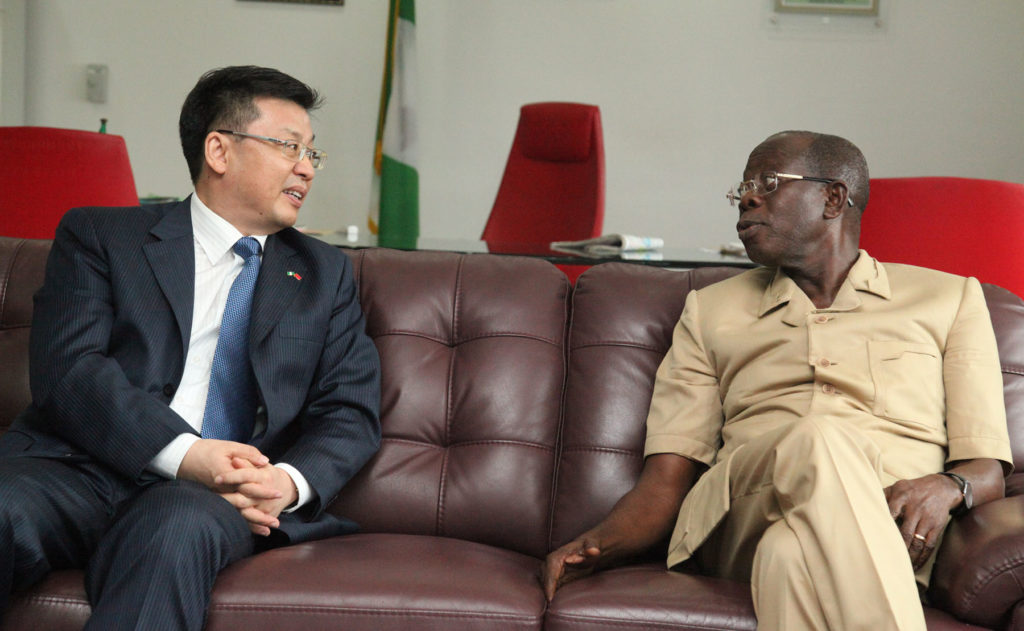 Governor Adams Oshiomhole of Edo State and Mr Liu Kan, Consul-General, Chinese Consulate during the Consul-General's visit to the Governor in Benin City, Tuesday