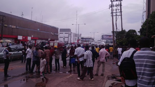 Angry youths protesting "irregular power supply, arbitrary and unregulated electricity tariffs/billings."