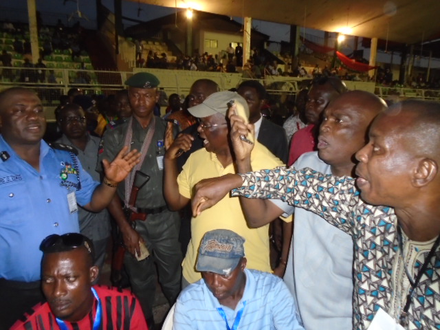 Tense moment at the governorship primary election of the All Progressive Congress in Benin City( Barrister Kenneth Imasuangbon in heated exchange with some delegates;and Engineer Chris Osa Ogiemwonyin also in a moment of tension and hot exchange of words with some delegates