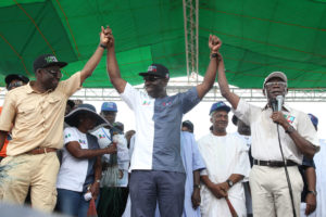 From left: Hon Philip Shaibu, APC gubernatorial running mate, Mr Godwin Obaseki. APC Gubernatorial candidate and Governor Adams Oshiomhole at the flag-off of the gubernatorial campaign of the All Progressives Congress for the September 10 election in the state, at the Samuel Ogbemudia Stadium, Benin City, on Saturday.