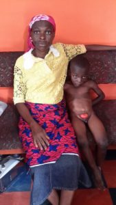 Mrs. Atoi and her little son, Testimony