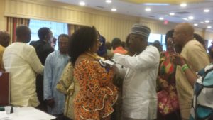 Here Engr. Bose Ogbeifun (left) being decorated by ENAW out-going President, Elder Franklin Omoruna (right) after her oath of office.