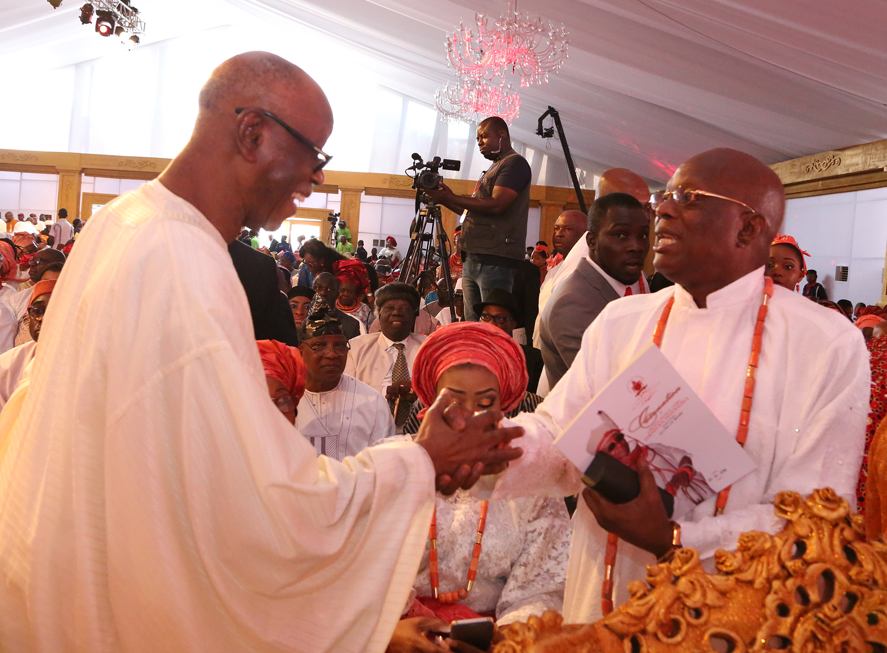 Chief John Odigie-Oyegun, National Chairman, APC and Dr Pius Odubu, Deputy Governor, Edo State at the coronation of His Royal Majesty, Omo n'Oba n'Edo Uku Akpolokpolo, Ewuare II, Oba of Benin, on Thursday.