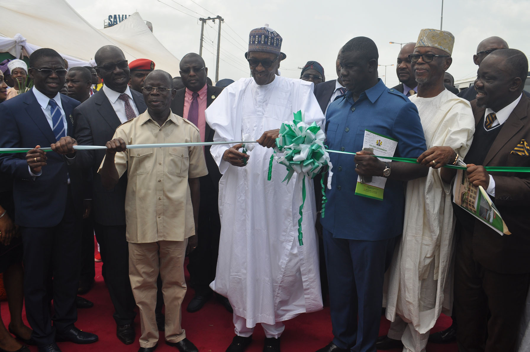 President Buhari at the commissioning of the 6-lane Siluko road, complete with street lights, walkways and underground drainage in the state capital.